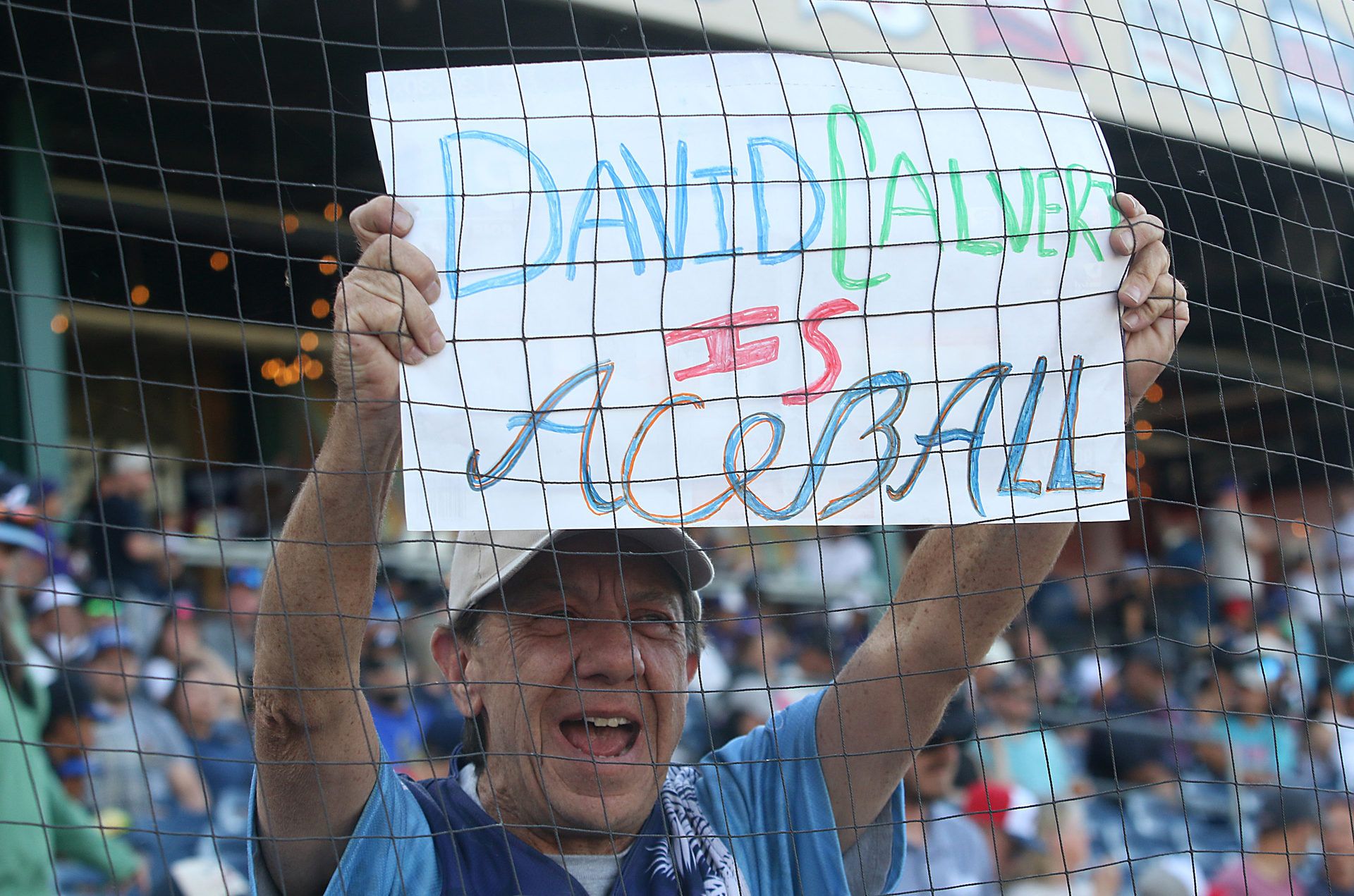 A fan holds a sign: A fan holds a sign: